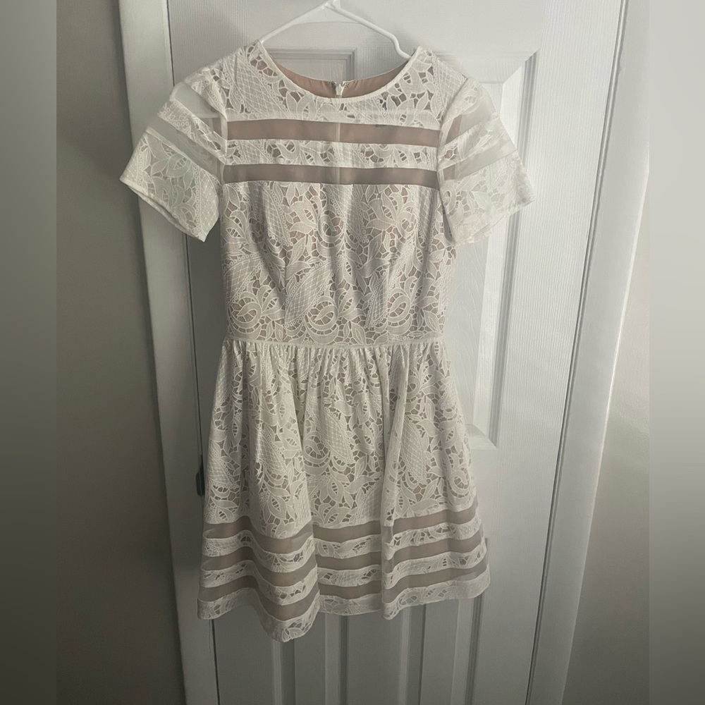 Bloomingdale’s Aqua brand. Lace dress with sheer details.